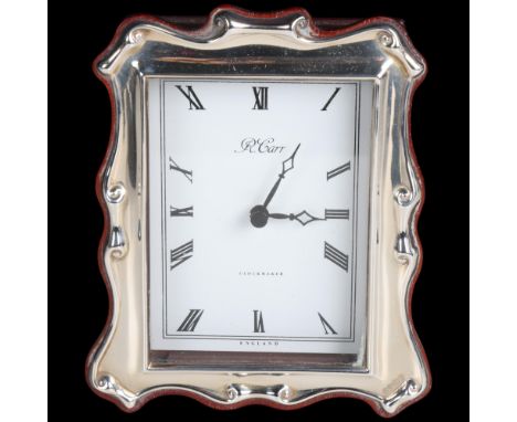 An Elizabeth II silver-fronted quartz mantel clock, R Carr, Sheffield 1989, 12.5cm x 9.5cm, boxedNew and unused 