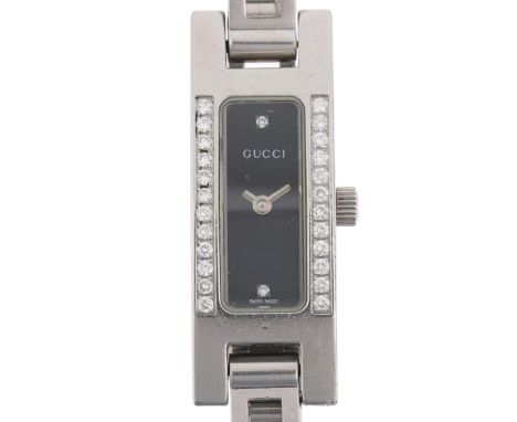 GUCCI - a lady's stainless steel diamond 3900L quartz bracelet watch, black dial with halfly diamond hour markers and diamond