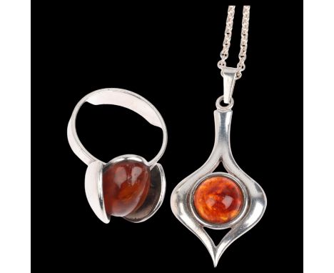 A a Danish modernist sterling silver amber openwork pendant necklace and ring, makers include Hermann Siersbol and Einer Ferh