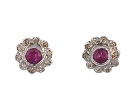 A pair of ruby and diamond flowerhead cluster earrings, with stud fittings, apparently unmarked, 8.1mm, 1.4gNo damage or repa