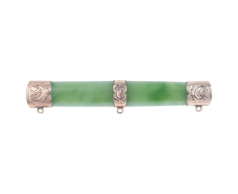 A large Victorian New Zealand greenstone tablet brooch, with unmarked gold mounts, 78.5mm, 15gGeneral wear to high points, no
