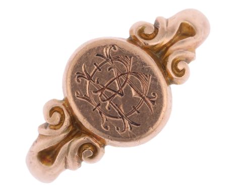 An early 20th century 9ct rose gold signet ring, maker WG&S, Birmingham 1911, central oval panel with engraved monogram BM, s