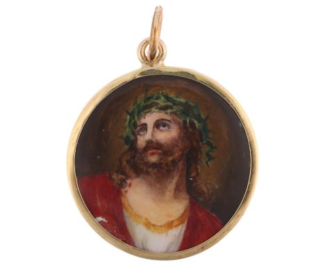 A Vintage enamel 'Jesus Christ' pendant, hand painted decoration with engine turned sunburst guilloche enamel backing and unm