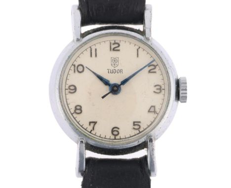 TUDOR - a lady's stainless steel mechanical wristwatch, circa 1969, silvered dial with applied gilt Arabic numerals, blued la