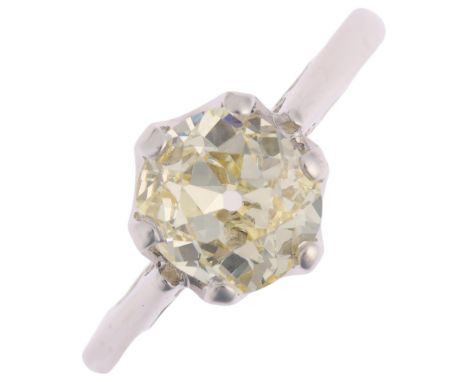 An 18ct white gold 1.9ct solitaire diamond ring, claw set with 1.9ct light yellow old-cut diamond, clarity approx VS1/VS2, di