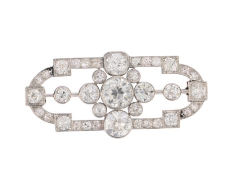 An Art Deco diamond geometric panel brooch, circa 1925, total diamond content approx 7ct, principal diamond approx 1.5ct, fla