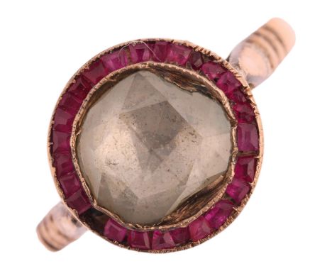 A mid-20th century ruby and diamond target cluster ring, in the Art Deco style, set with 8mm Dutch rose-cut diamond surrounde