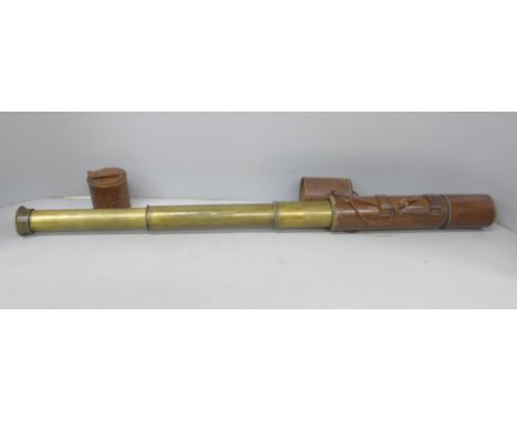 A brass telescope with leather case, 77cm extended