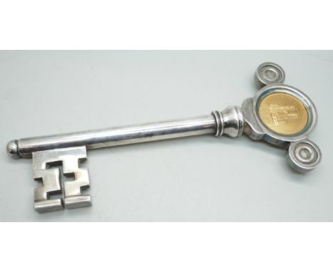 A large novelty corkscrew bottle opener in the form of a key commemorating the Coronation of Queen Elizabeth the II 1953, 20.