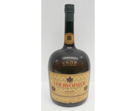 A display large bottle of Courvoisier Cognac, a White Label Dewar's Scotch whisky figure and an empty large bottle of Long Jo