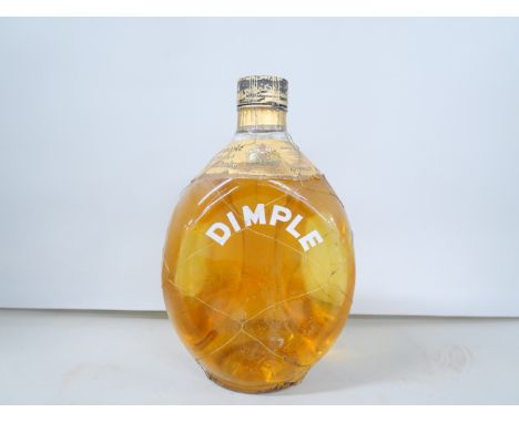 A bottle of Dimple Old Blended Scotch whisky, distilled and bottled by John Haig &amp; Co. **PLEASE NOTE THIS LOT IS NOT ELIG