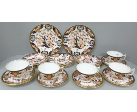 Royal Crown Derby tea ware, 5 cups, 7 saucers, 8 side plates and two larger plates, (2 cups cracked, one saucer with small ch