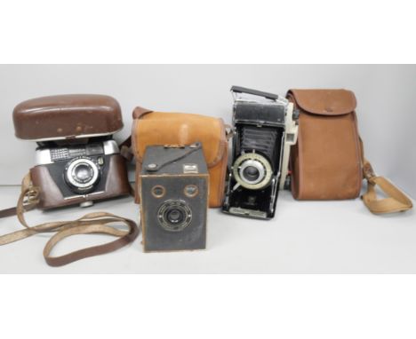 Three cameras, comprising of Box Brownie Junior, Kodak Concertina camera and a Regula Sprinty. All cased.