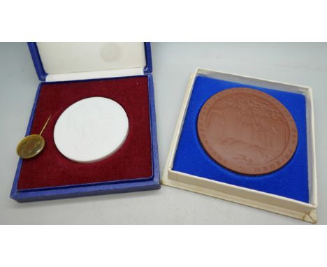 Two German porcelain plaques, one Karl Marx, and a Karl Marx pin