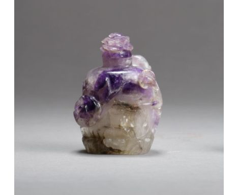 A Chinese amethyst snuff bottle Qing Dynasty Well hollowed and carved in high relief with flowering prunus branches, the flor