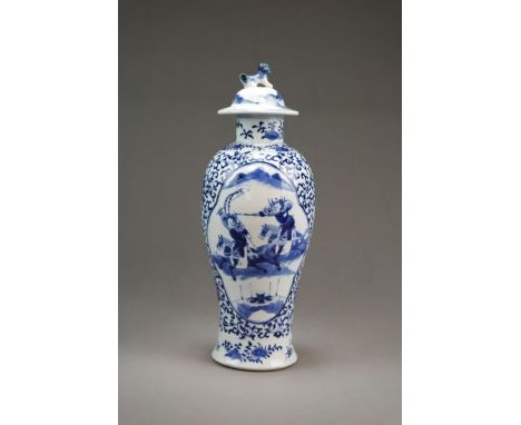 A Chinese blue and white vase and coverKangxi four-character mark but 19th CenturyOf baluster form, the domed cover with lion