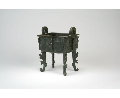 A Chinese bronze archaistic censer, FangdingXuande six-character mark but Qing Dynasty or laterOf rectangular form with twin 