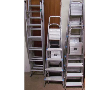 A collection of aluminium ladders, step ladders etc