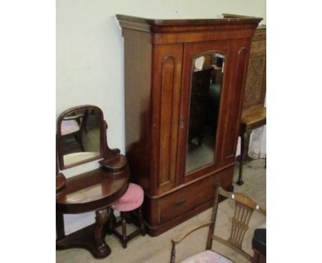 A Victorian mahogany wardrobe together with a Victorian Duchess dressing table and a stool 