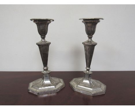A pair of Harrison Brothers & Howson Regency style silver candlesticks with octagonal bases, Sheffield 1913, 20cm tall