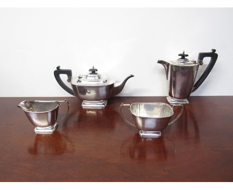 A Selfridge & Co Ltd. four piece silver teaset comprising teapot, hot water jug, twin handled sucrier and milk jug, Birmingha