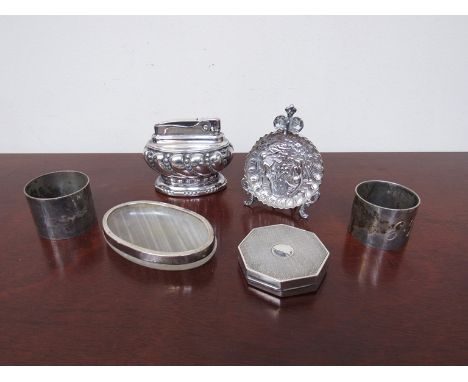 A selection of silver and silverplate including two napkin rings, octagonal pill pot, ornate dish and table lighter, 146g sil