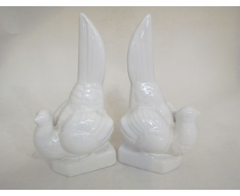 A pair of ceramic bookends as pheasants 