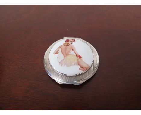 A silver compact with engine turned detail, set with a later porcelain plaque depicting a flapper girl, Birmingham 1933, 6.5c