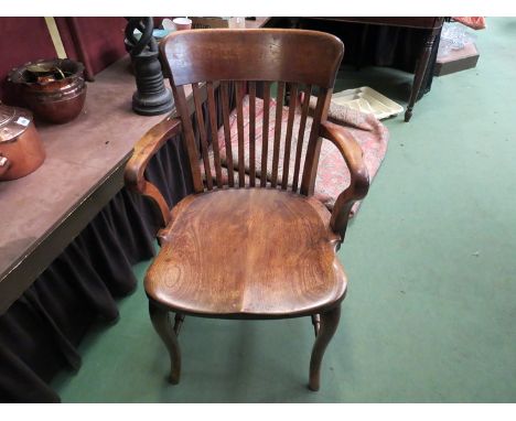 An elm seated stick back carver chair with cabriole legs