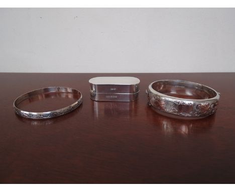 Two silver bangles and silver ring/trinket box (3), 74g 
