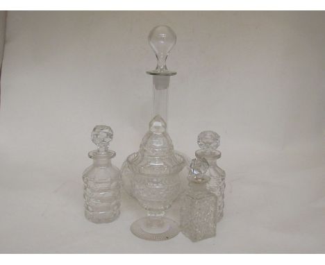 A Victorian decanter, glass honey pot and three glass scent bottles  