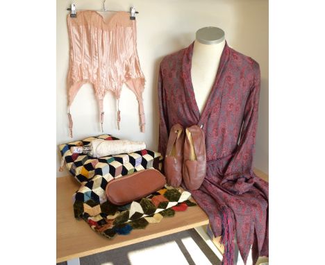 A collection of antique and vintage inner wear, along with an example of antique folk craft. A Twilfit British Made boned bus