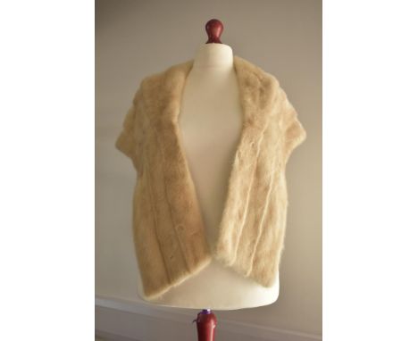 A vintage blonde mink shawl, having a wide collar and taupe satin lining.