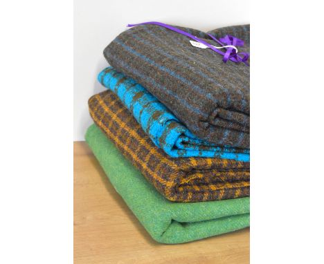 Four bolts of vintage Isle of Skye tweed, woven by award winning Portnalong weaver, Ewen MacLeod, in unique and rare colour w
