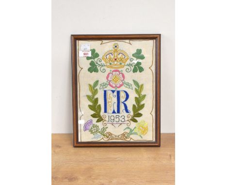 A framed embroidery commemorating Queen Elizabeth II 's coronation in 1953.