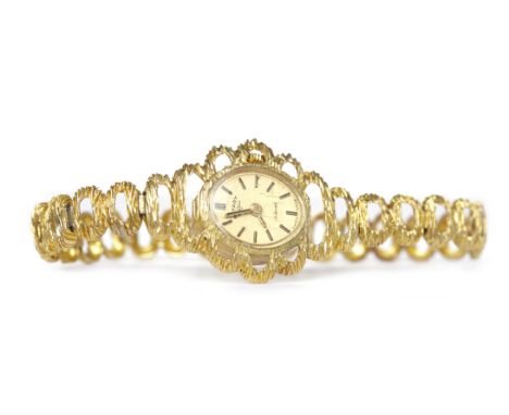 LADY'S ROTARY NINE CARAT GOLD MANUAL WIND COCKTAIL WATCHthe oval gold coloured dial with applied gold coloured baton hour mar