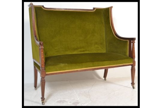 A 19th Century Two Seater Mahogany Inlaid Art Nouveau Sofa In The