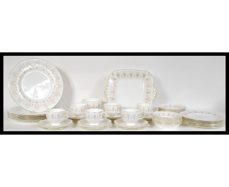 A 20th Century bone China part dinner and tea service by Wedgwood in the Medina pattern, consisting of various sized plates, 
