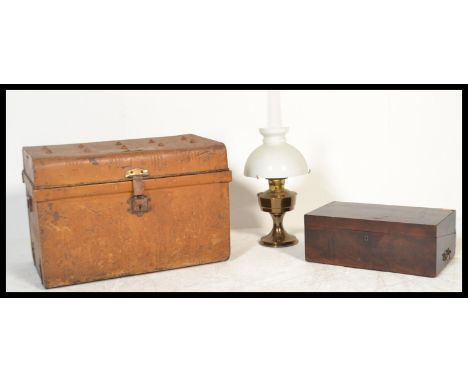 A vintage early 20th Century tin metal travel steamer&nbsp; trunk, applied travels labels to top for GWR, along with a 19th C