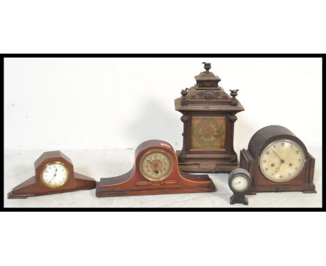A collection of clocks dating from the 19th Century to include Mantel clocks, Napoleon hat clock etc.