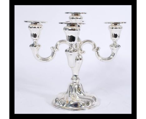 A vintage 20th century WMF silver plated five point candelabra having scrolled branch arms.&nbsp;Measures: 24cm high x 24.5cm