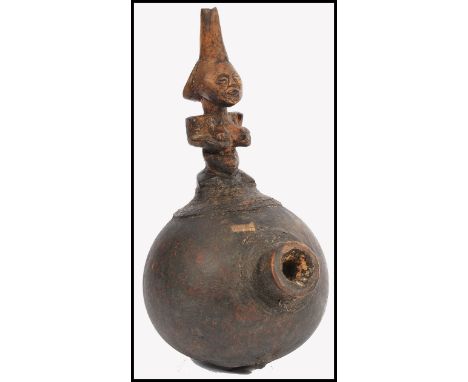 An early 20th century African Congalese Luba tribe - Tribal chiefs gourd pipe. Of bulbous form with carved fertility female w