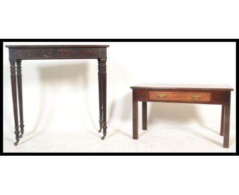 A 19th century Victorian mahogany Gillows style console - side table being raised on tapered reeded legs terminating in brass