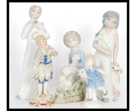 In the style of Lladro - A selection of ceramic figurines to include a girl with a lamb sat on her knee, a small child runnin