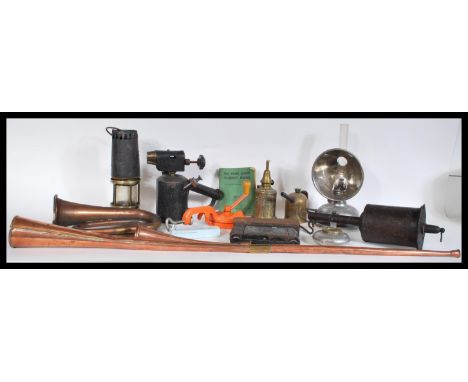 A collection of vintage items to include copper horns, hunting long horn, smaller example, bugle, miners lamp, chrome oil lam