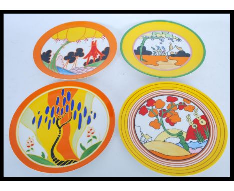 A set of four Clarice Cliff for Wedgwood limited edition collectors cabinet plates by The Bradford Exchange to include 'Windb