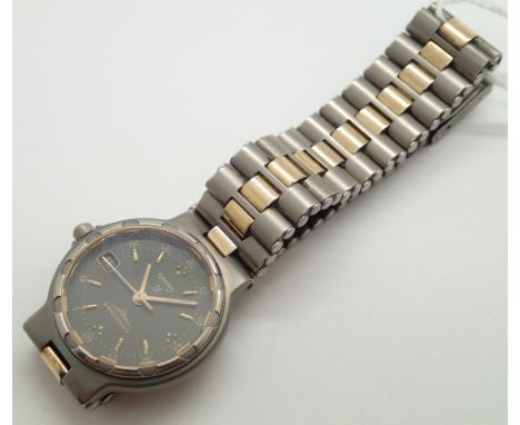 Ladies Longines Conquest titanium wristwatch on a biometric bracelet  CONDITION REPORT: This item was NOT working at lotting.