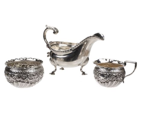 * Silver Sauce Boat. An Edwardian silver sauce boat, James Dixon & Sons, Sheffield 1902, with gadrooned rim and acanthus flyi