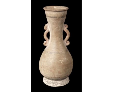 * Vase. A Chinese pottery vase, probably Han Dynasty, with Bluett &amp; Sons trade label, of baluster form with two scroll ha