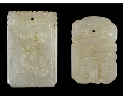 * Jade. Chinese jade pei, one side carved with a dragon with smoke coming from its mouth, the other with Chinese characters, 